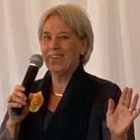 Stina making a speech at her book launch, cropped